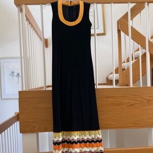 Unique Black Crepe Maxi Dress with Golden Yellow Trim and Patterned Hem